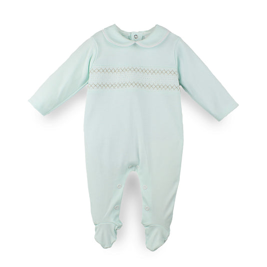 A pale mint green baby footed sleepsuit with long sleeves, a Peter Pan collar, and delicate smocked detailing across the chest, displayed on a clean white background.