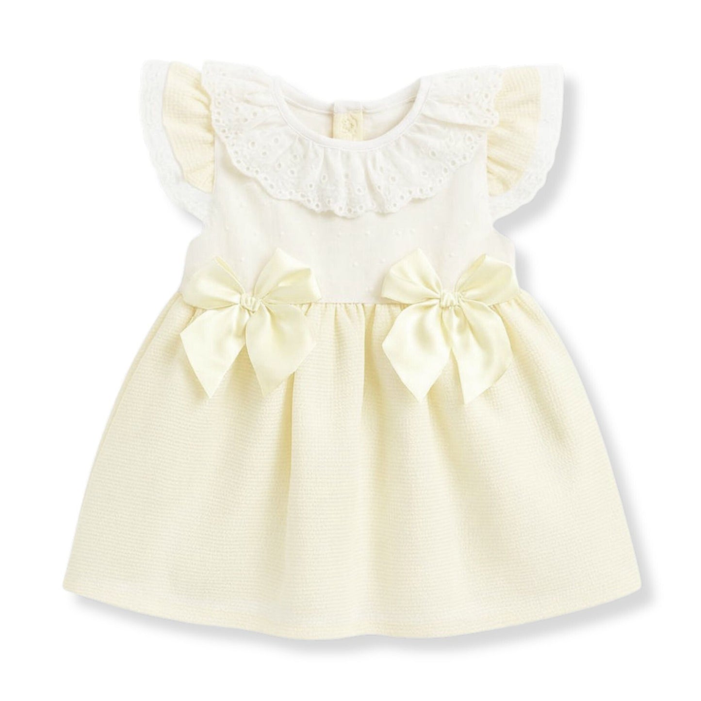 Yellow dress with ruffled collar and bow details on a white background
