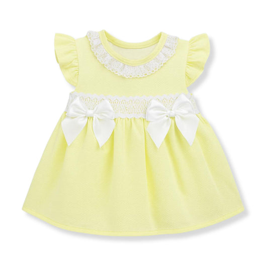 Yellow baby dress with lace detail, smocking and bows, Spanish style outfit made in Portugal