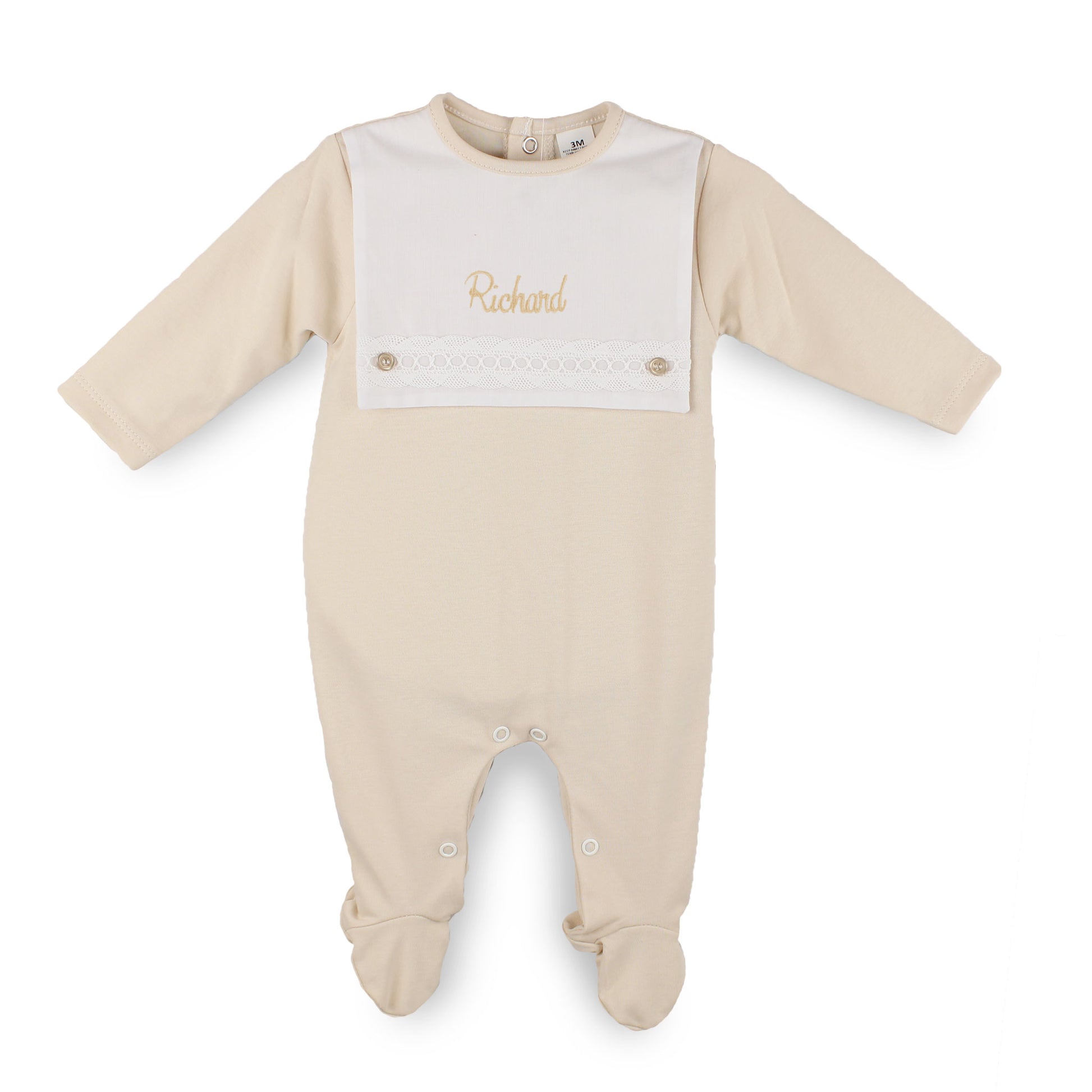 personalised baby boy beige sleepsuit with white bib on front