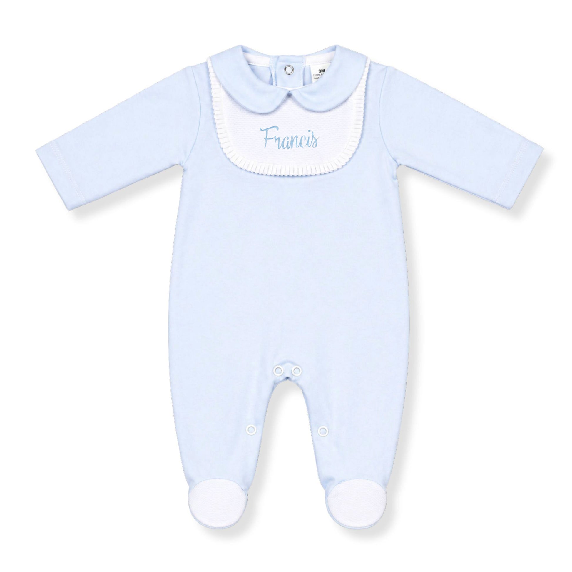 Light blue baby grow with white collar and 'Francis' embroidery on a white background