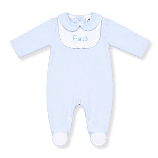 Light blue baby grow with white collar and 'Francis' embroidery on a white background