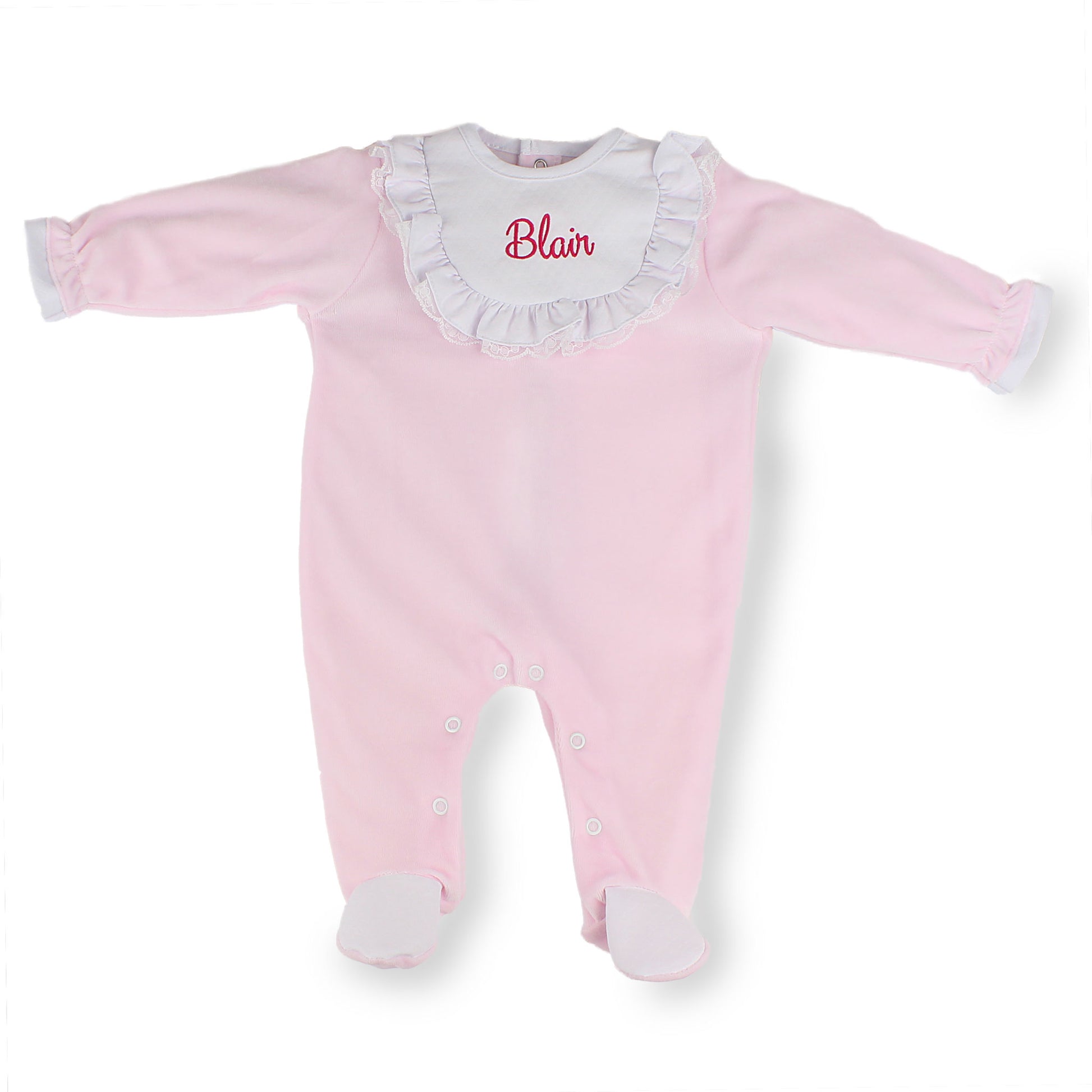 Pink baby onesie with white ruffled collar and embroidered name on a white background