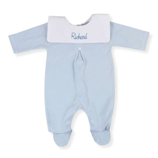 Personalised blue baby babygrow with white bib collar embroidered with a baby's name, made in Portugal from 100% cotton.