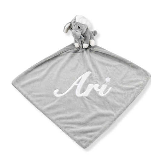 Personalised grey elephant baby comforter with embroidered name in a soft nursery setting