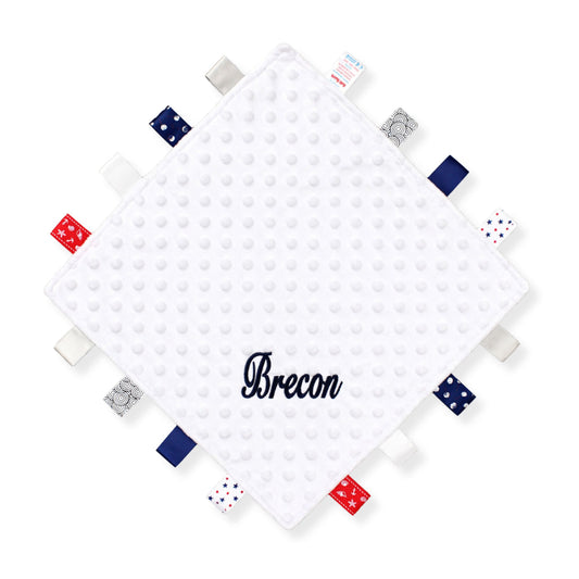 Personalised white taggy baby comforter with textured fabric and ribbon taggies