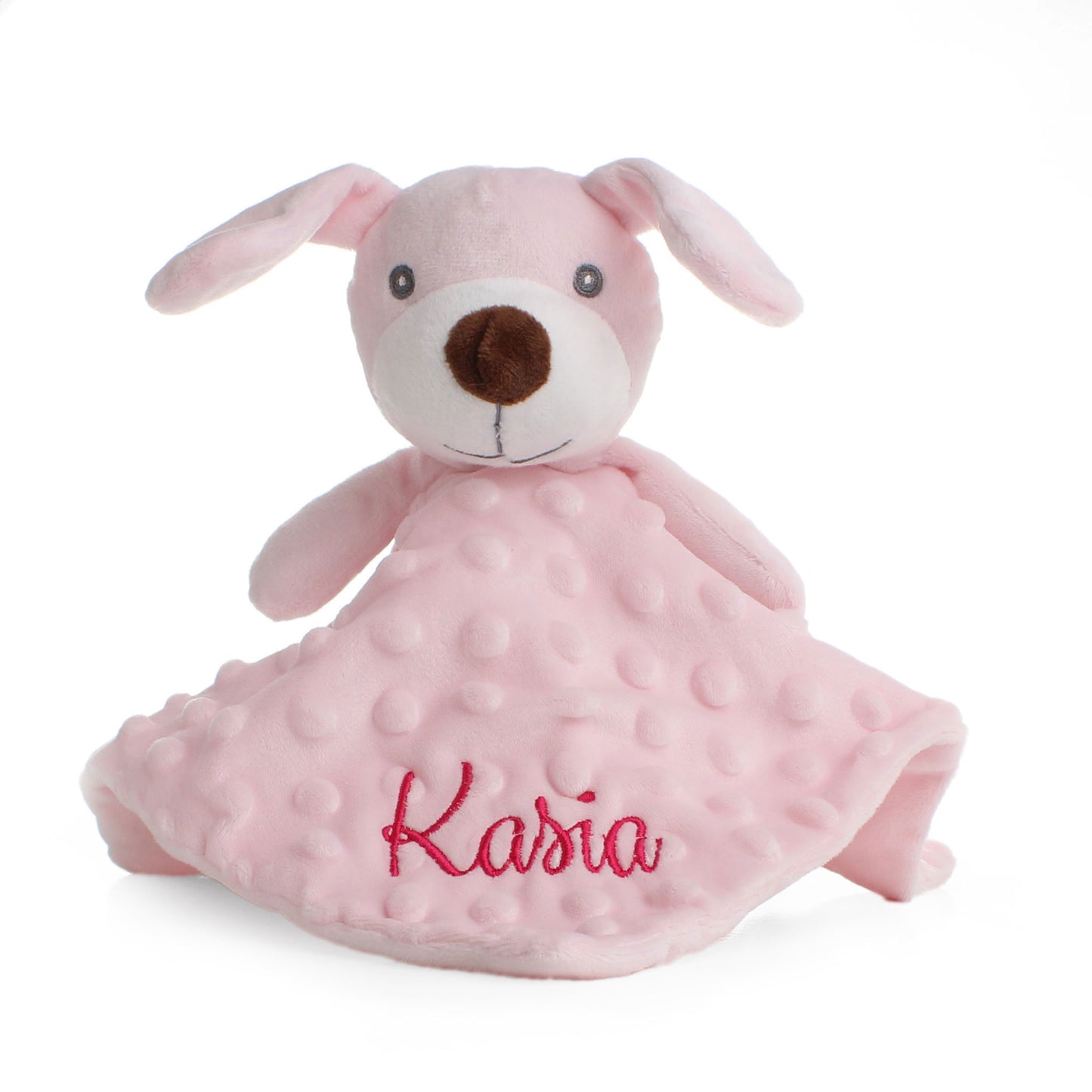 Pink plush dog toy with 'Kasia' embroidered on it against a white background