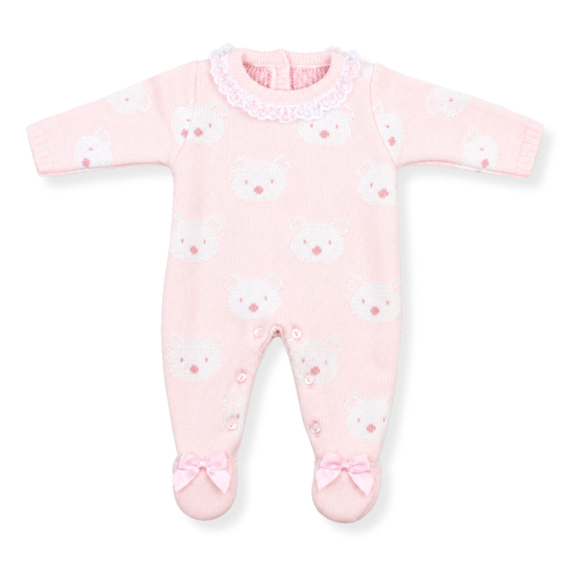 Pink baby onesie with star pattern and bow details on a white background