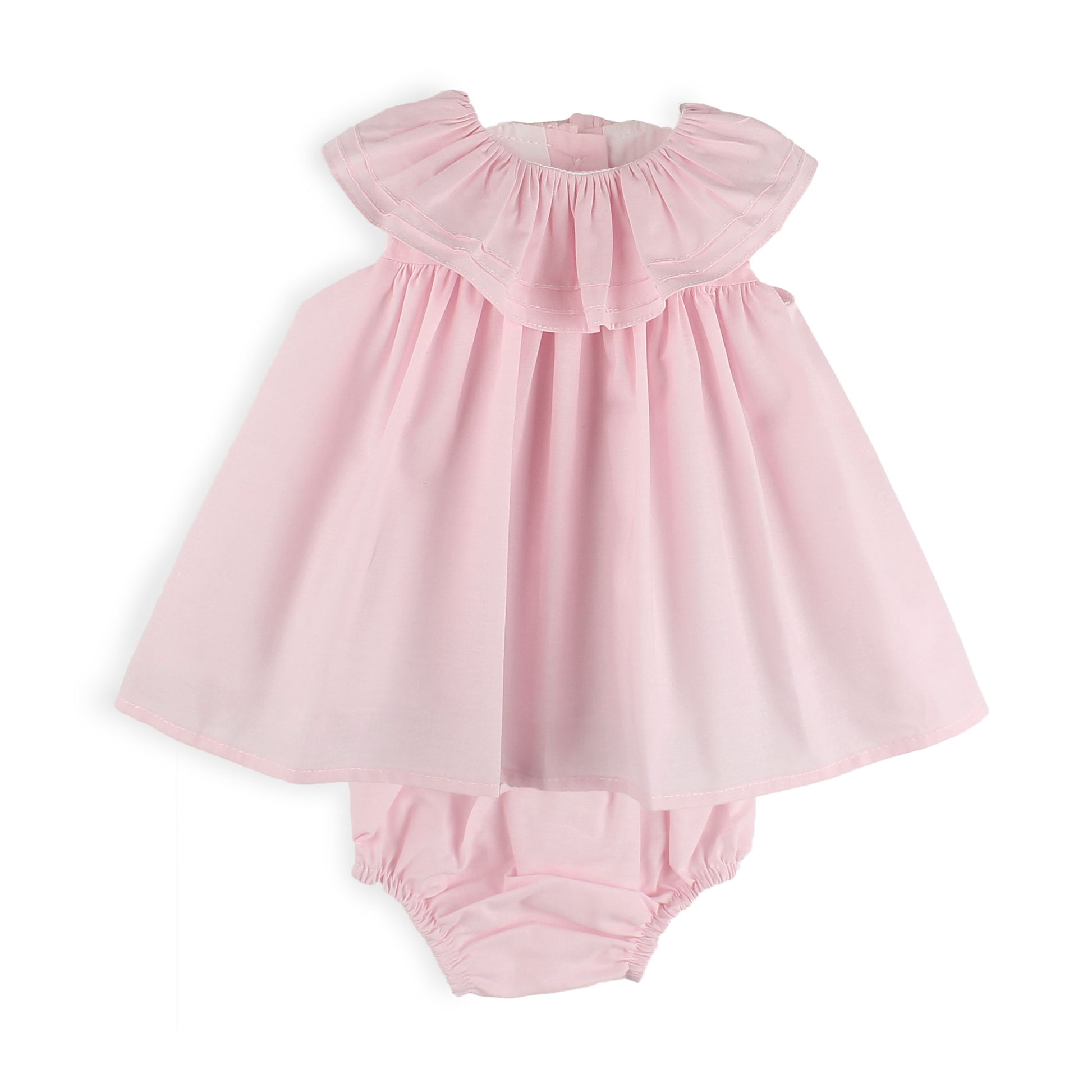 Pink baby dress with ruffled neckline on a white background