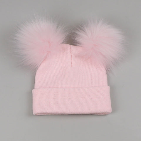 pink double pom pom hat