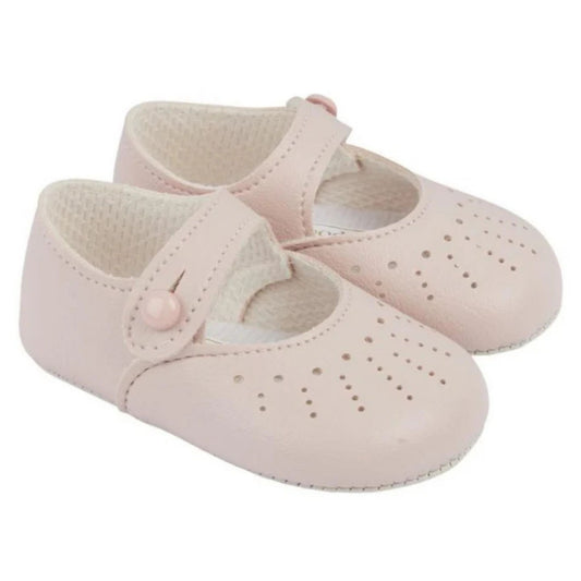 Pair of pink baby shoes with a strap on a white background