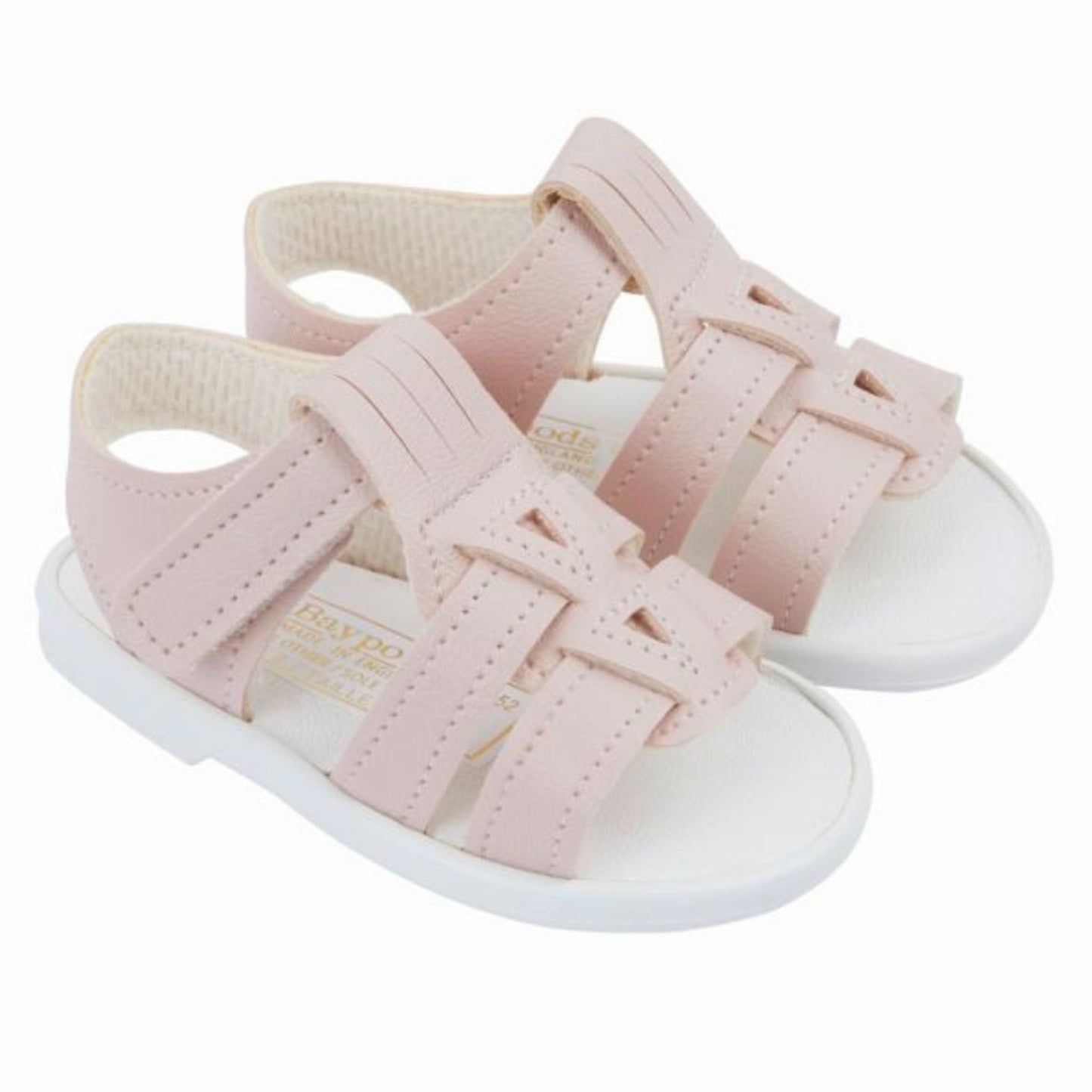 Pair of pink sandals with white soles on a white background