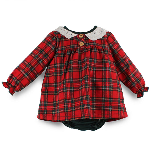A baby girl's long-sleeve plaid romper dress in red and green tartan, featuring a white lace Peter Pan collar with two wooden buttons.