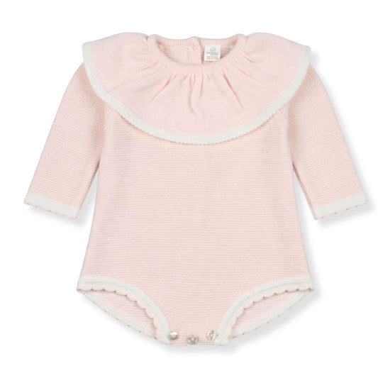 Pink baby bodysuit with long sleeves on a white background