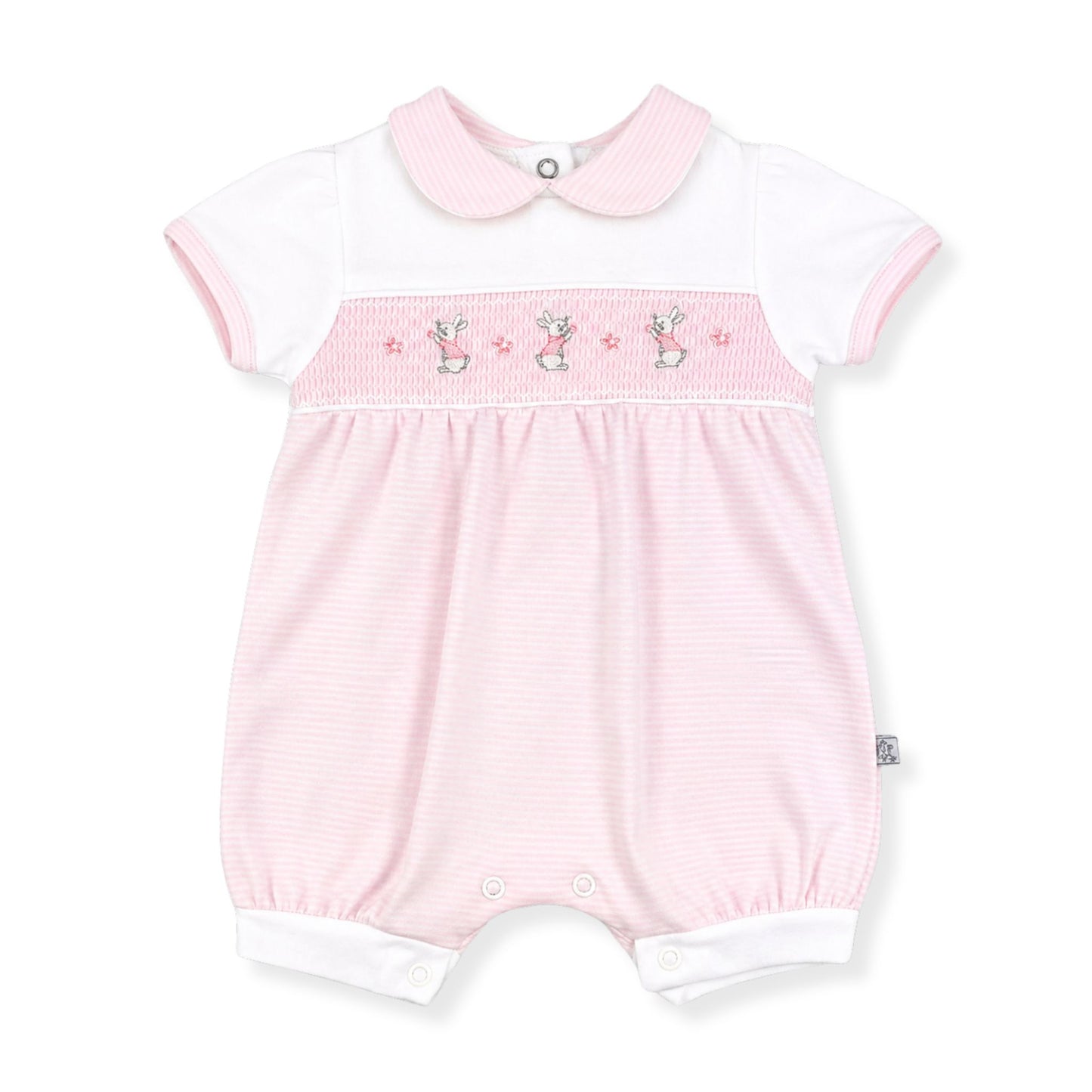 Pink baby romper with white trim  and embroidered bunnies by Dandelion Babywear on a white background