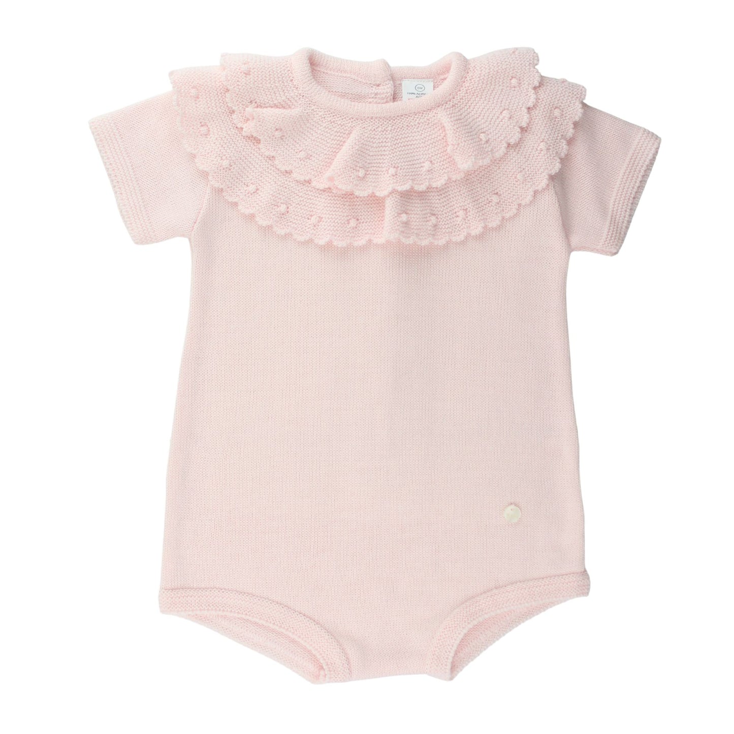 Pink baby knitted romper with ruffled collar on a white background