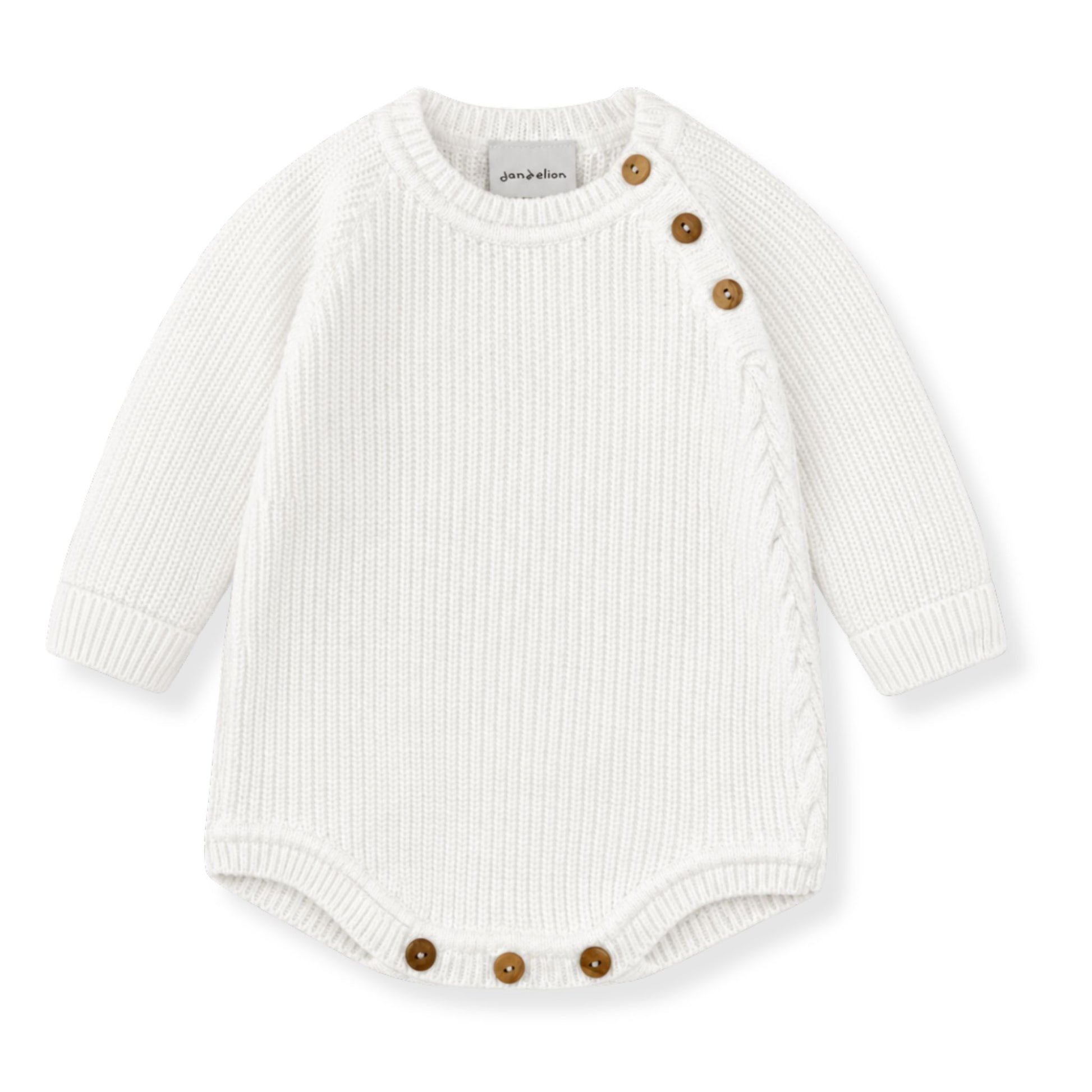 knitted white baby romper by dandelion