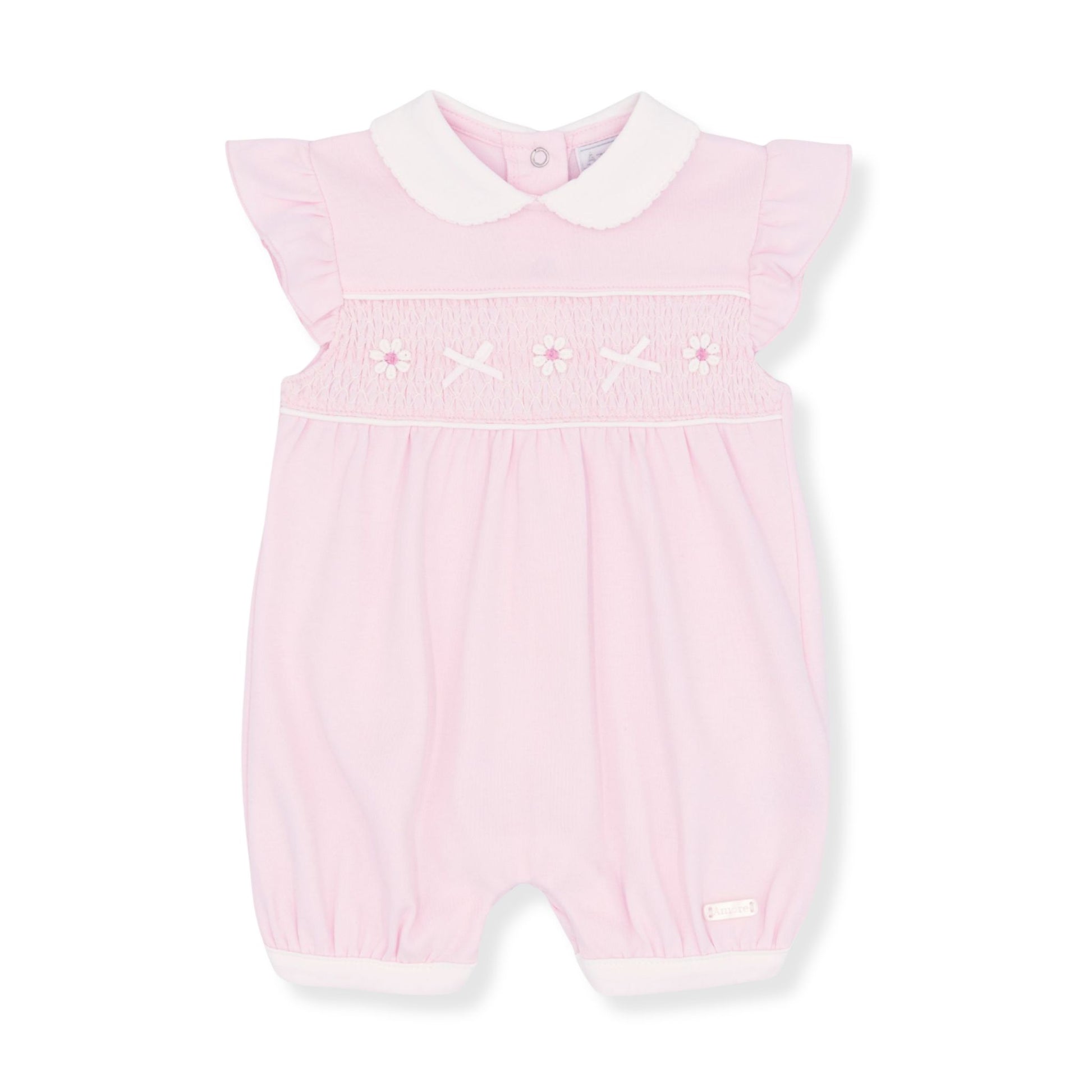 Pink baby romper with white collar on a white background