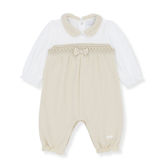 Baby romper with white shirt and beige pants on a white background