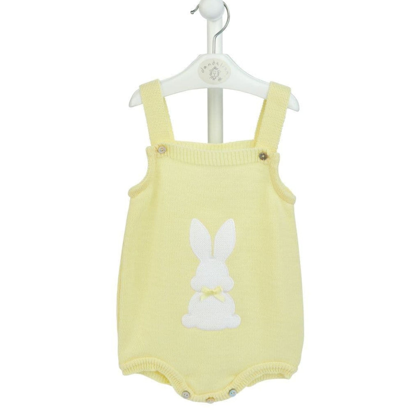 Yellow baby romper with bunny design on a white background