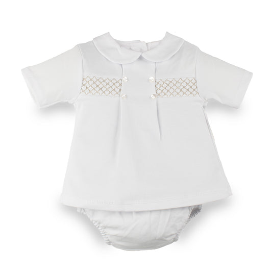 A white short-sleeve baby top with a Peter Pan collar, decorative beige smocking chest panel, and white pants, shown on a plain white background.