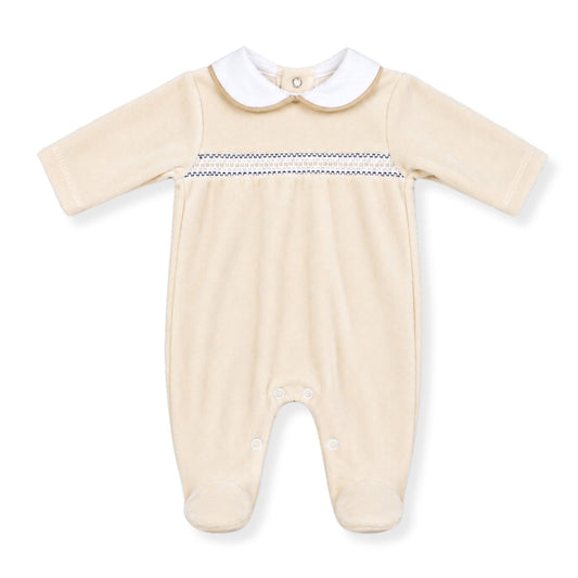Baby boys beige velour sleepsuit with white Peter Pan collar and smocked chest detail, footed babygrow on a white background