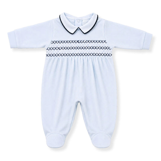 Baby blue babygrow with smocked design on a white background