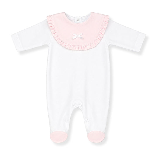 White baby onesie with pink ruffled collar on a white background
