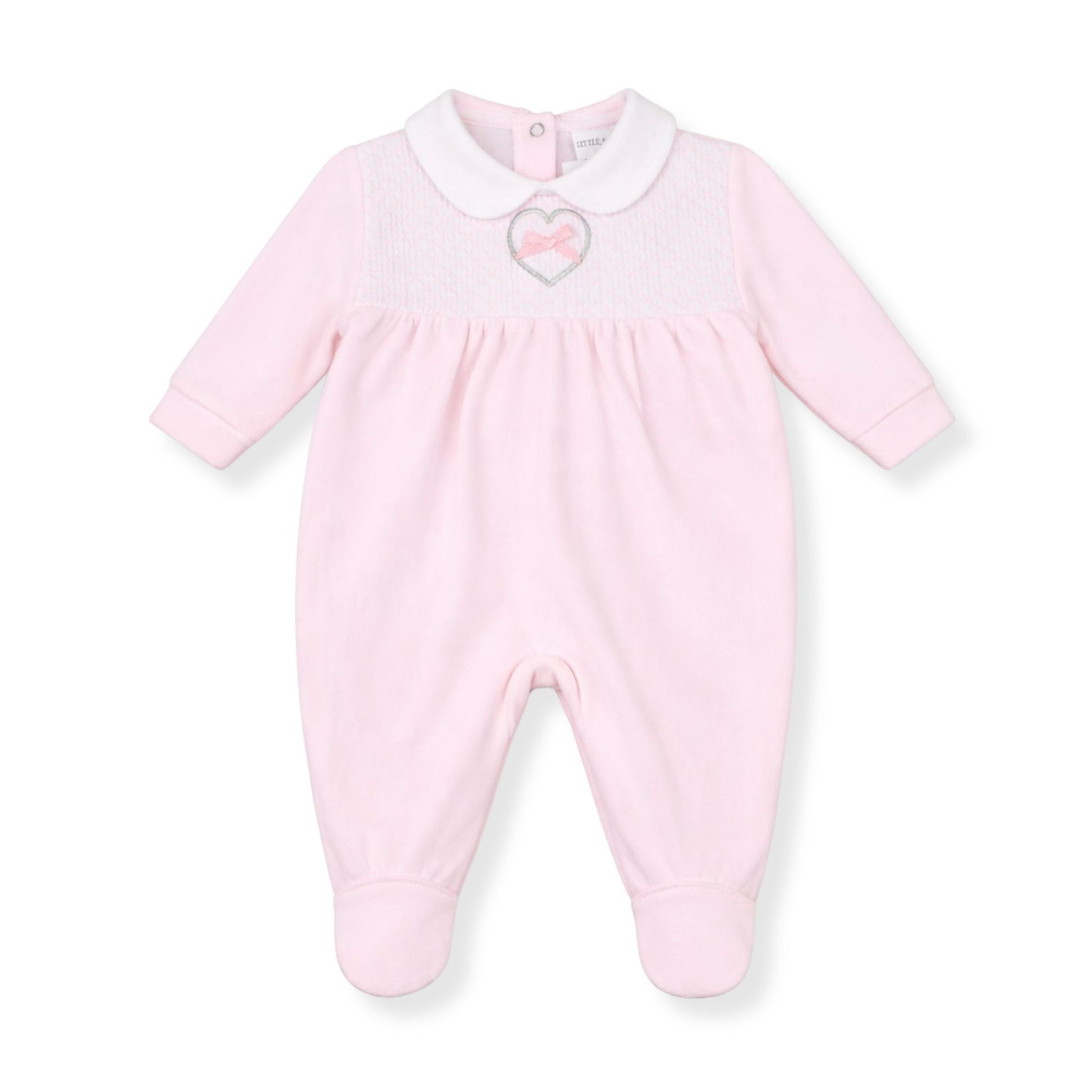 Pink baby onesie with a heart design on a white background