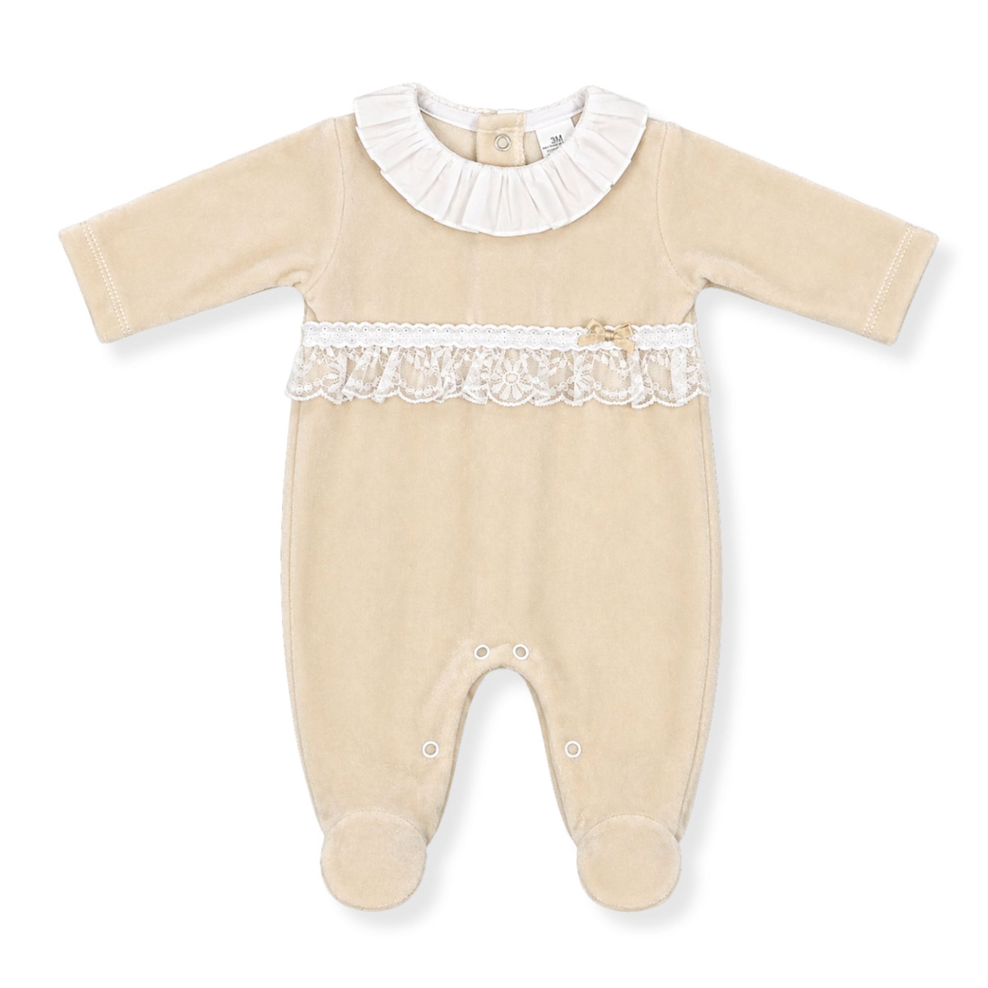 Beige baby grow with white lace details on a white background