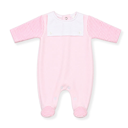 Pink baby sleepsuit with white accents on a white background