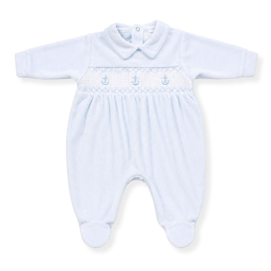 Light blue baby sleepsuit with smocked design on a white background