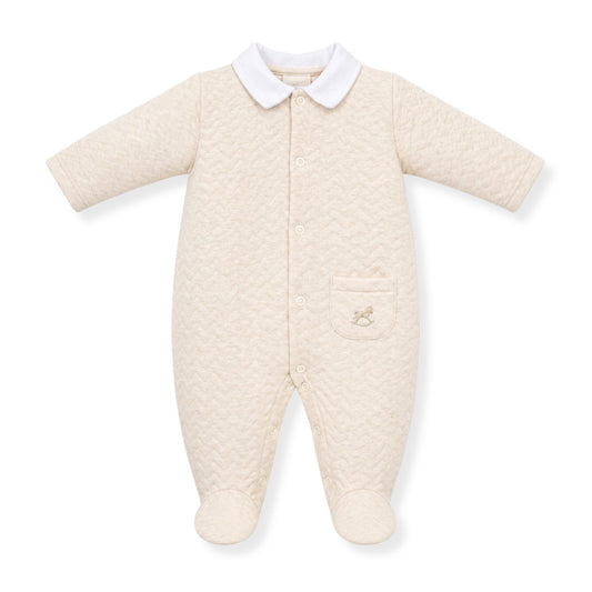 Quilted baby onesie with a collar on a white background