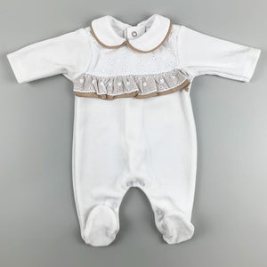 white beige baby sleepsuit