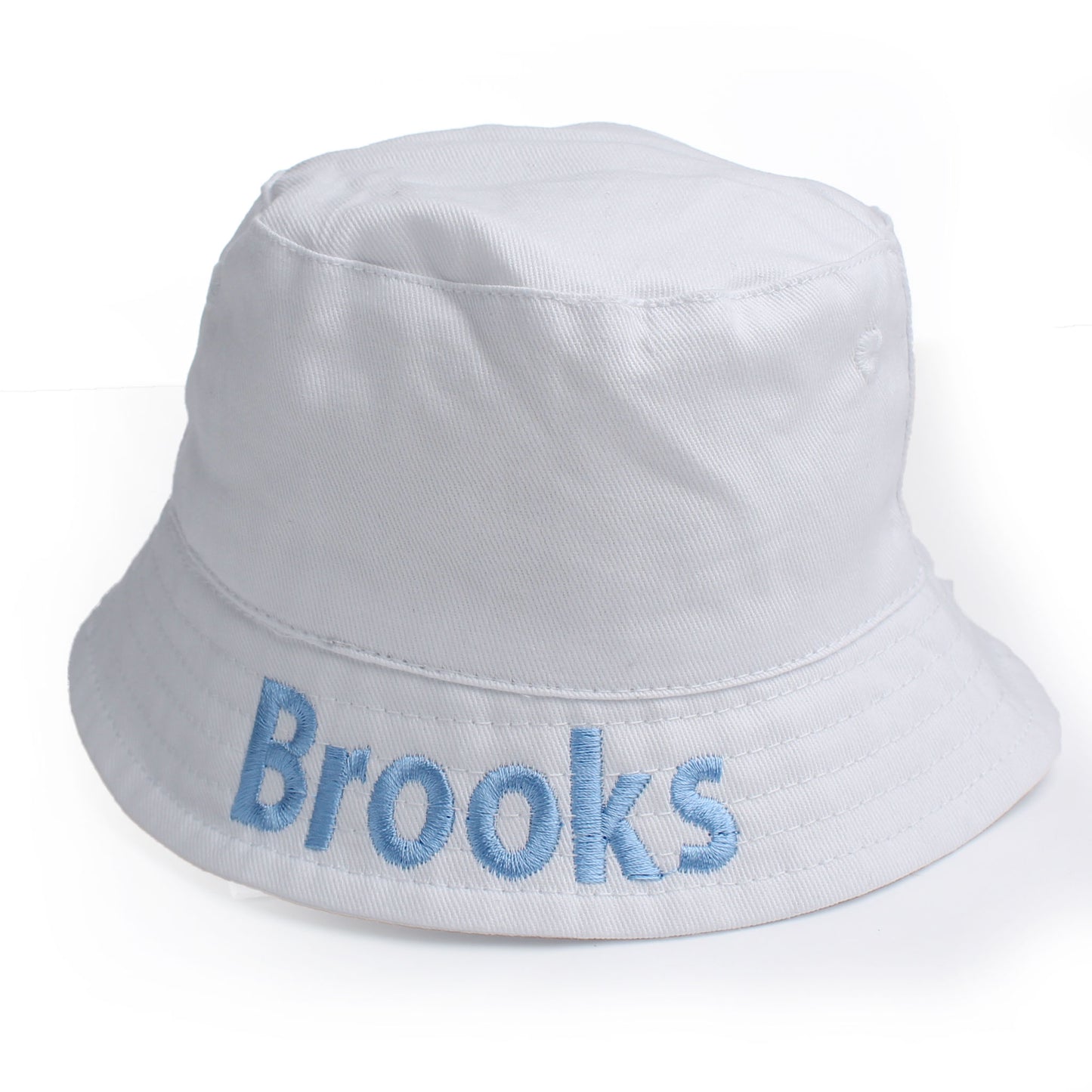 White baby personalised bucket hat with name embroidered in blue on a white background