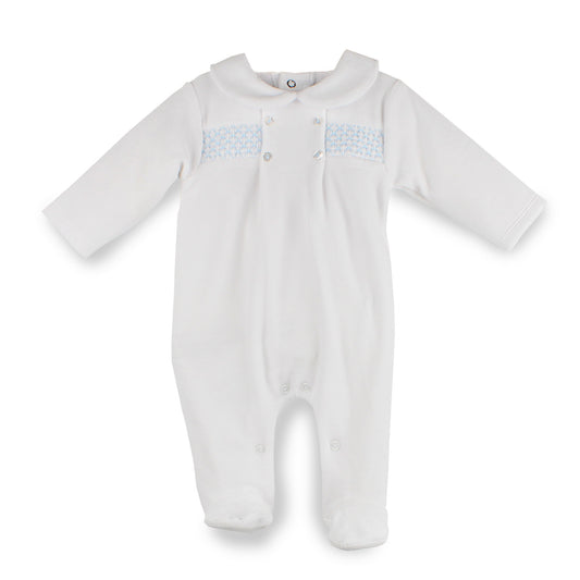 White baby velour sleepsuit with blue smocking  on a white background