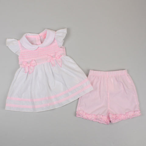 baby girls two piece dress and shorts outfit in pink smocked and bows