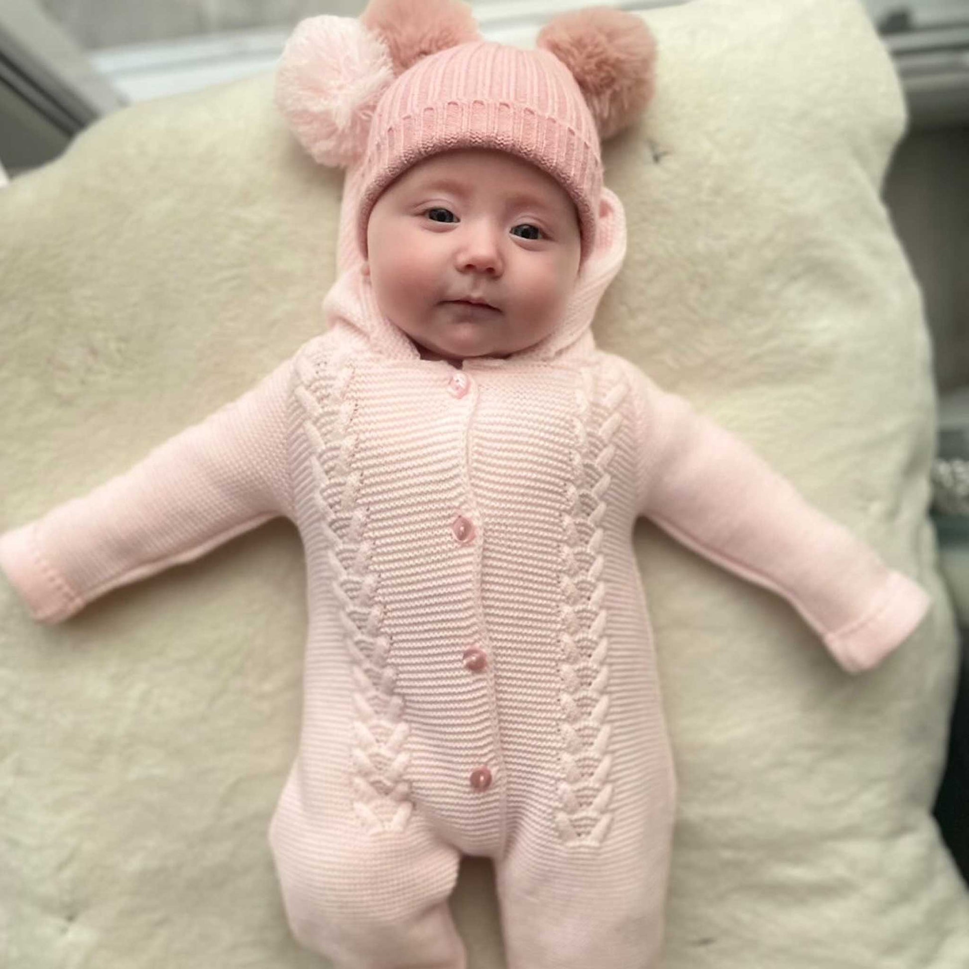 baby girls pink knitted all in one