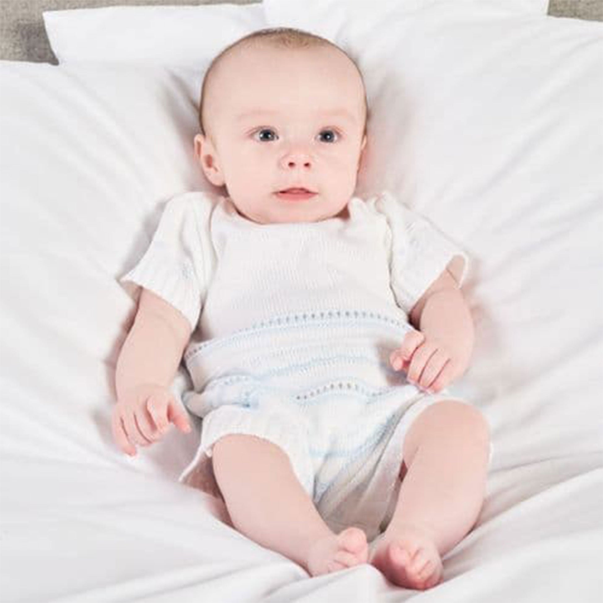 blue and white knitted baby boys romper