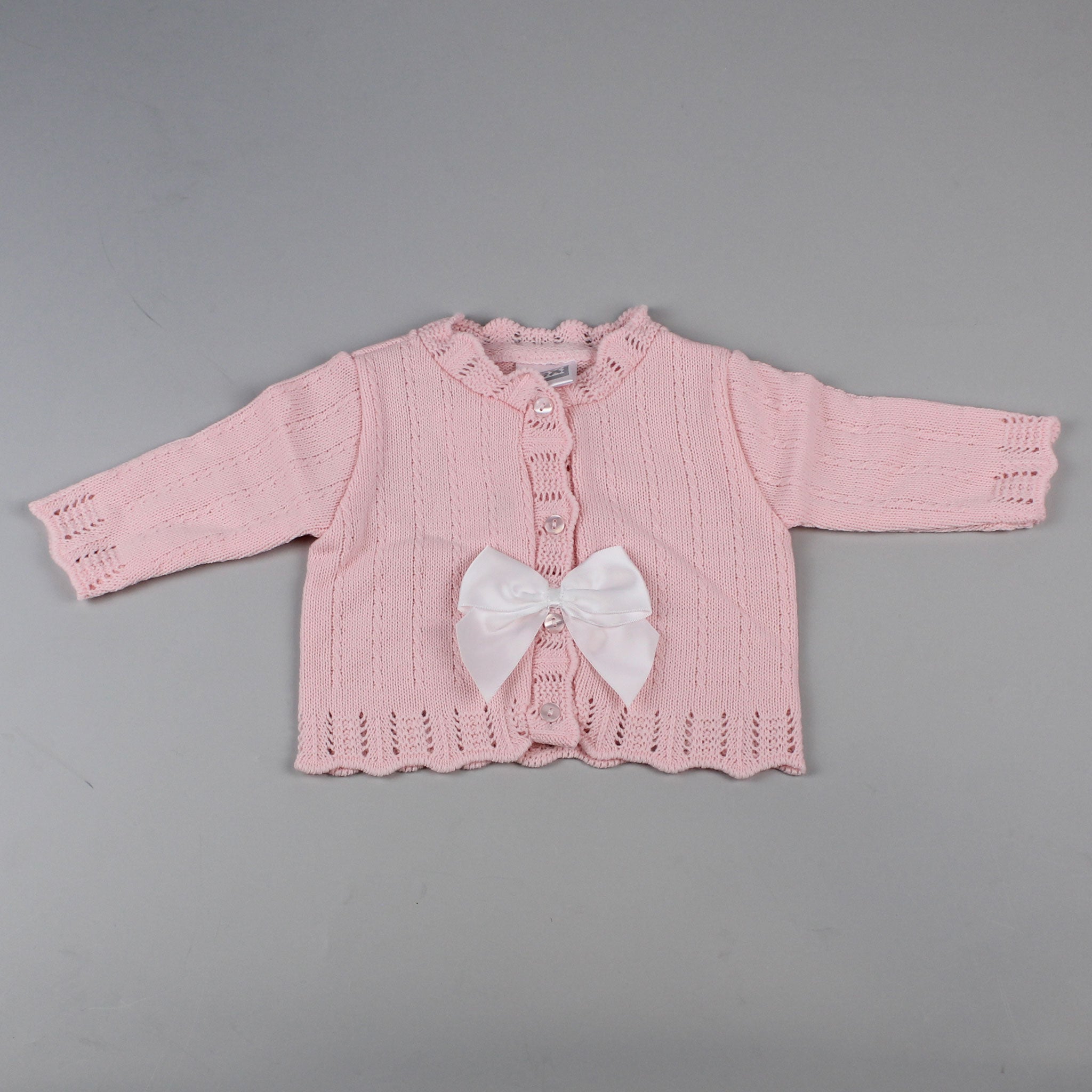 baby girl cardigan pink with bow in a spanish style