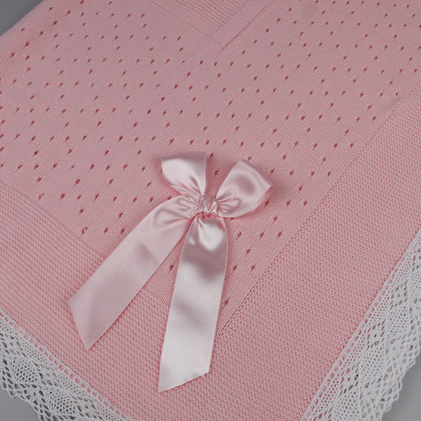 Knitted spanish pink blanket with bow