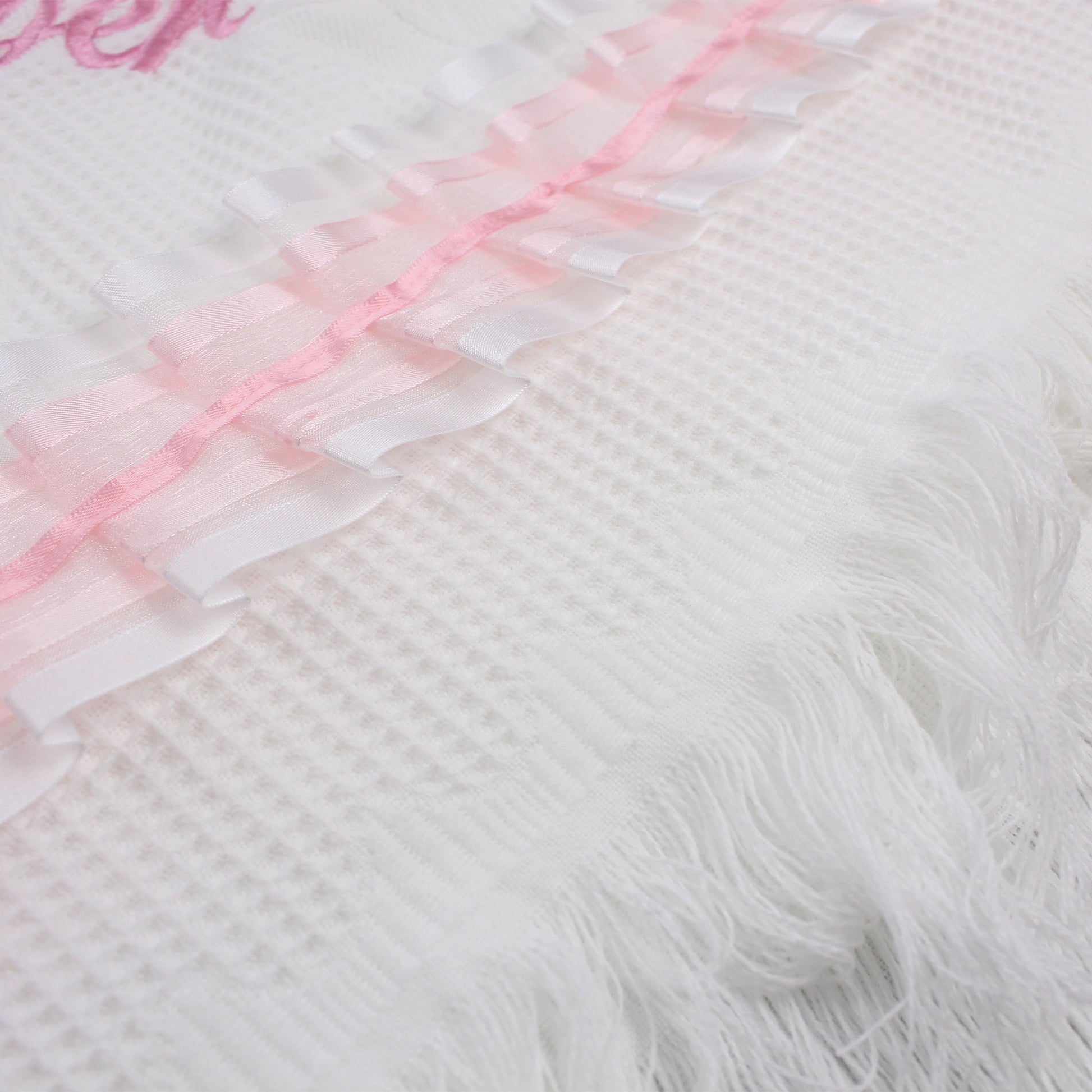 side of pink and white shawl