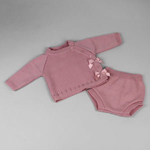 Knitted baby outfit in dusky pink