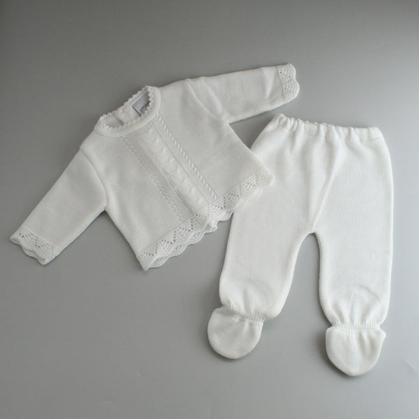 white knitted baby two piece