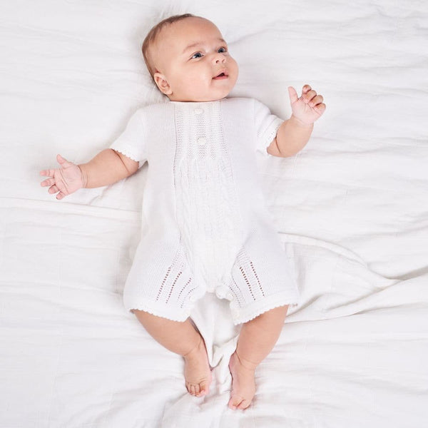 baby unisex white all in one knitted romper