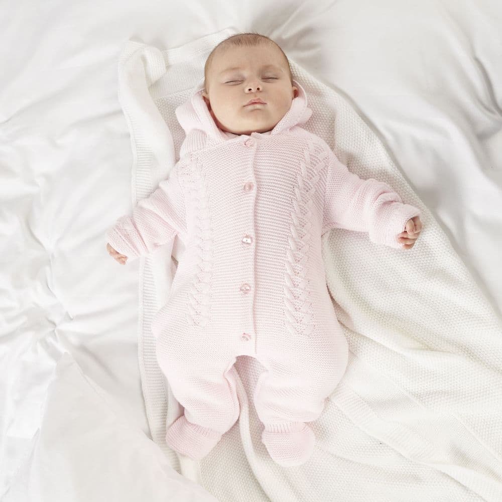 pink knitted all in one baby girls outfit with hood