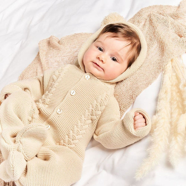 baby beige knitted all in one with hood