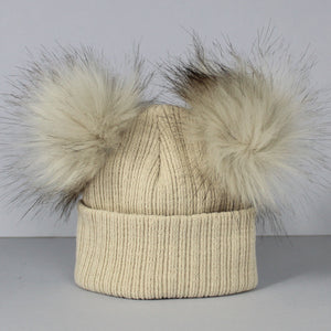 beige double pom knitted hat