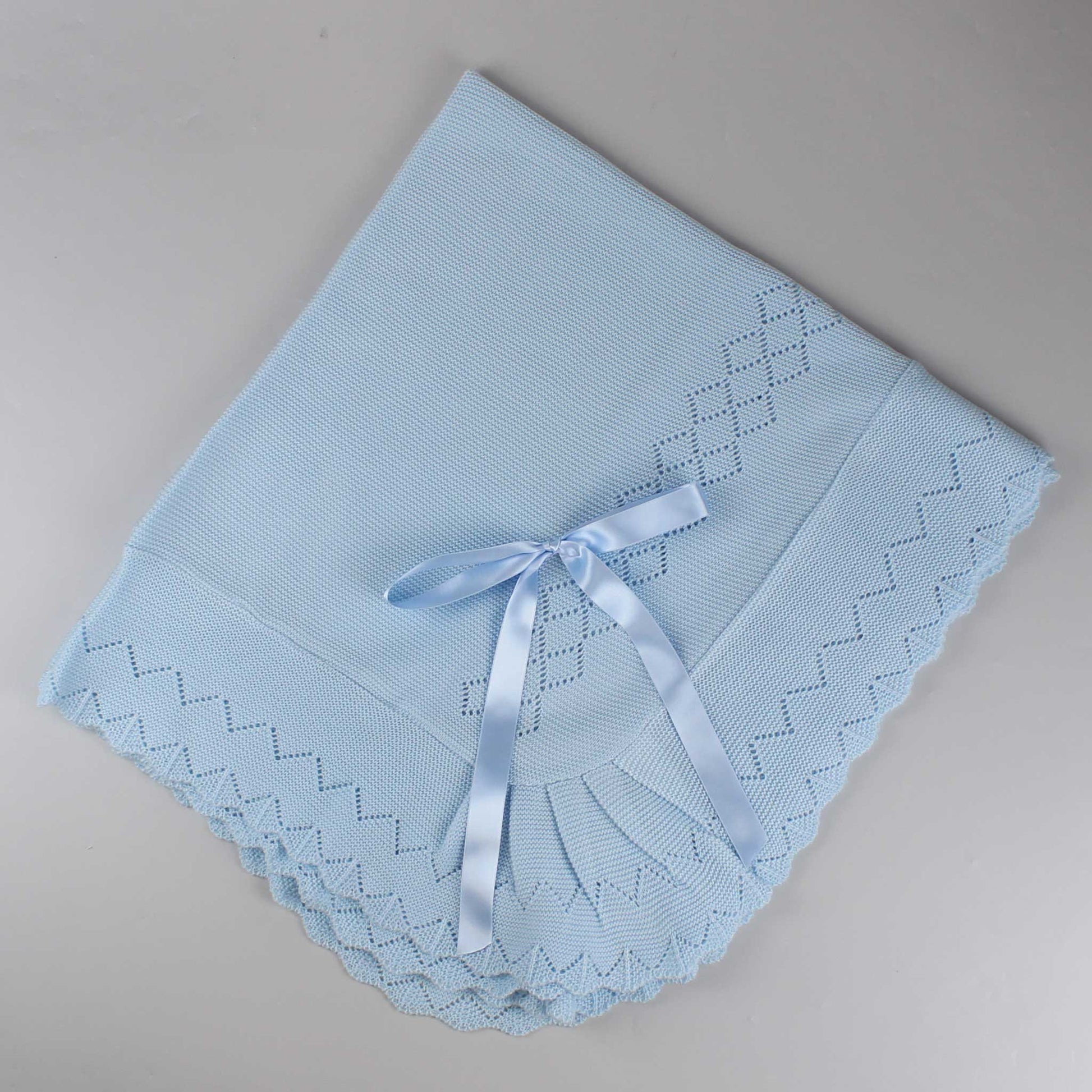 blue knitted shawl
