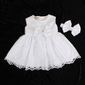 baby girls white christening dress with headband and design